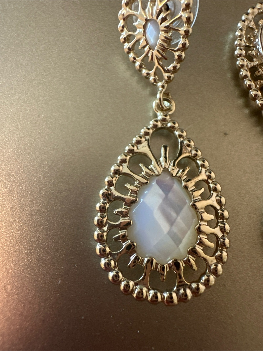 Kendra Scott Gold Teardrop Earrings with Opalescent White Stones - Picture 3 of 4